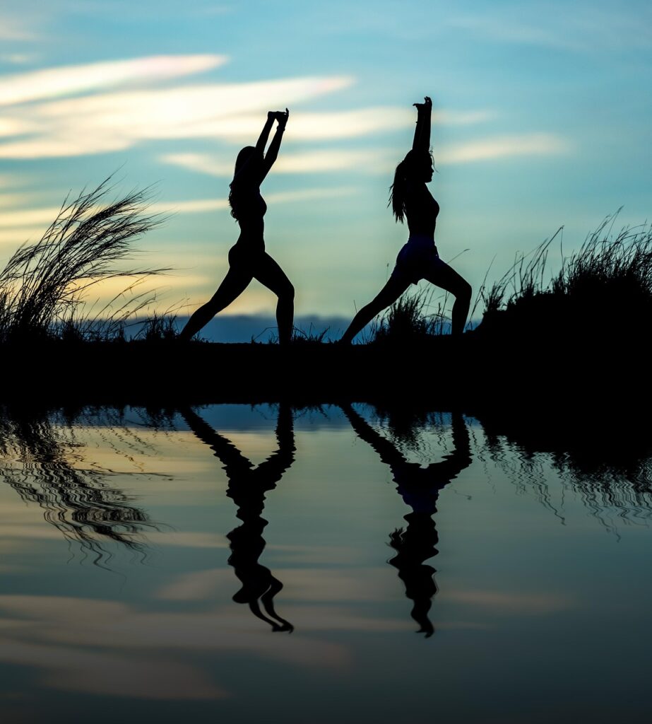 women, yoga, silhouettes, water, reflection, mirroring, water reflection, pose, posing, yoga pose, meditation, stretching, wellness, well-being, exercise, adults, asia, girls, morning, nature, outdoors, pair, people, stance, sunrise, sunset