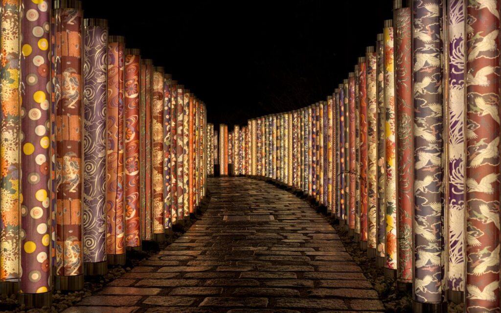 Explore Kyoto's vibrant Kimono Forest, an artistic nighttime display of illuminated kimono textiles.