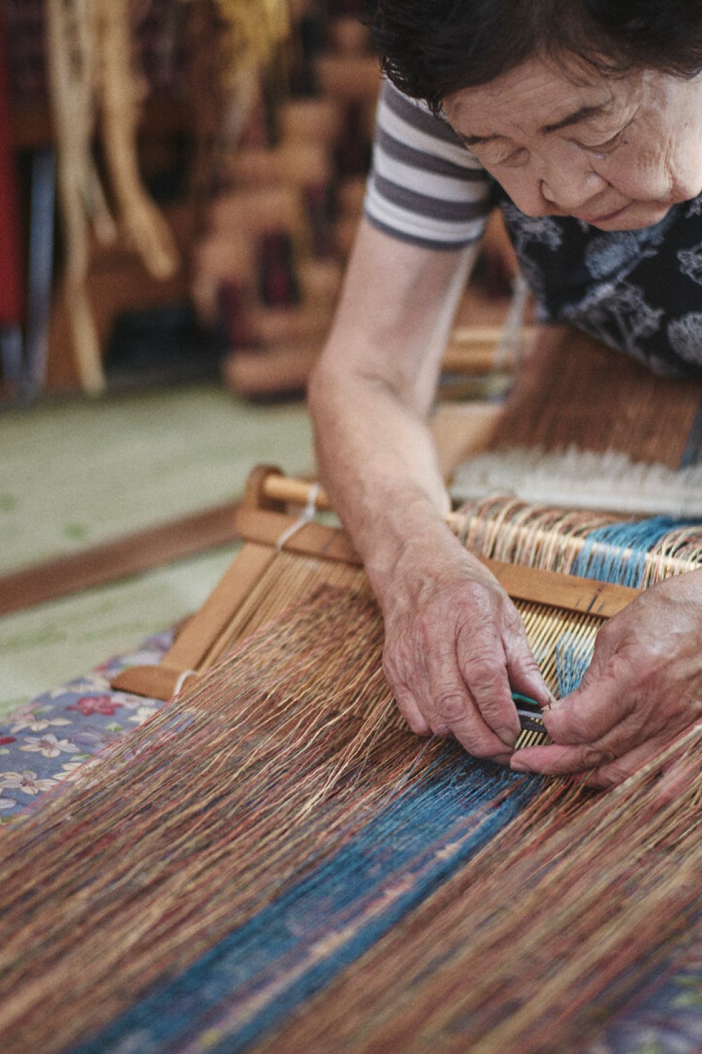 Démonstration des savoir-faire à l'origine de pattern représentant certaines communautés comme celle des Ainou
